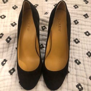 Black suede pumps